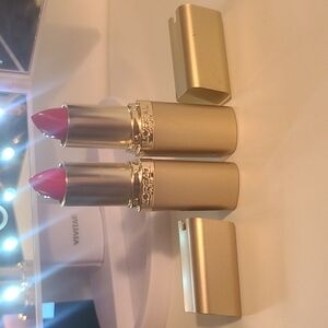 L'oreal lipstick two different shades magenta 185 and true red 315.